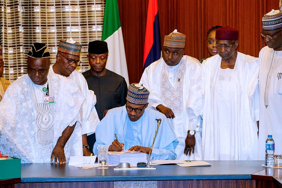 Buhari Signing Budget 2018