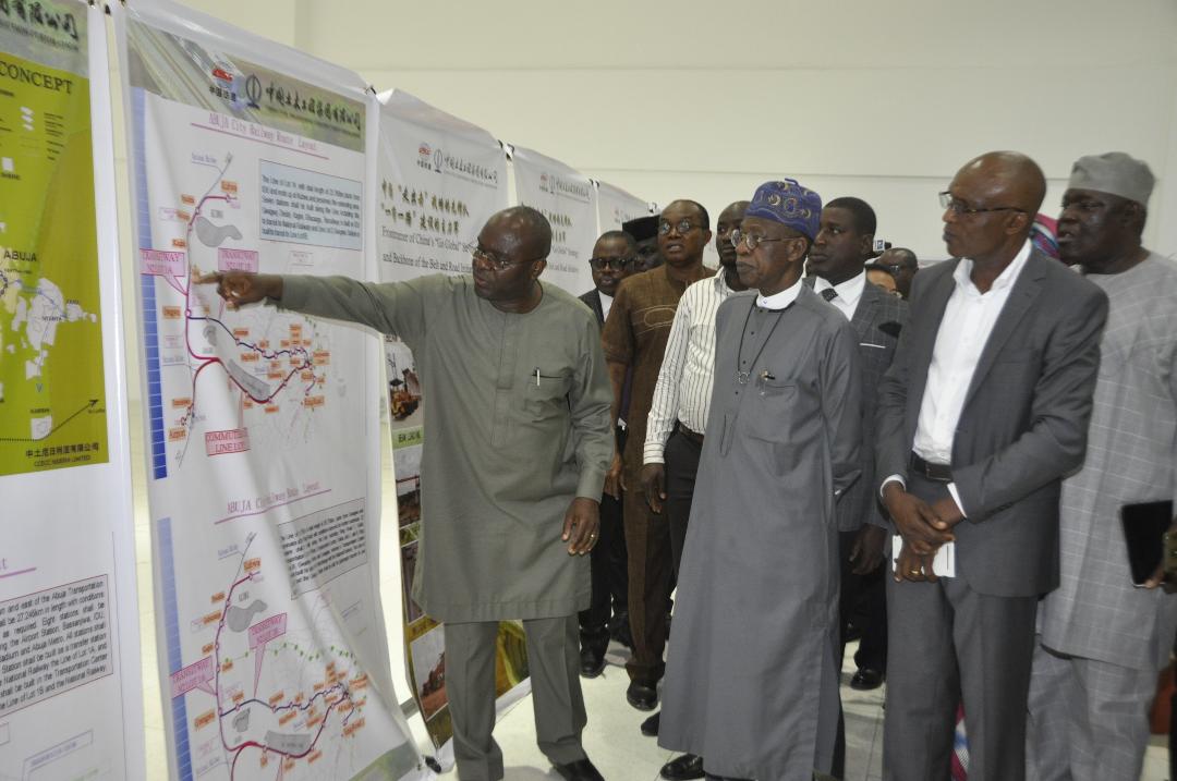 Secretary, Transport Secretariat of the Federal Capital Territory Administration, Mr. Kayode Opeifa (left), Minister of Information and Culture, Alhaji Lai Mohammed (middle) and the Chief Resident Engineer for Abuja Rail Project, Mr. Anthony Agbakoba, during a facility tour of the Abuja Light Rail Project by the Minister on Thursday.